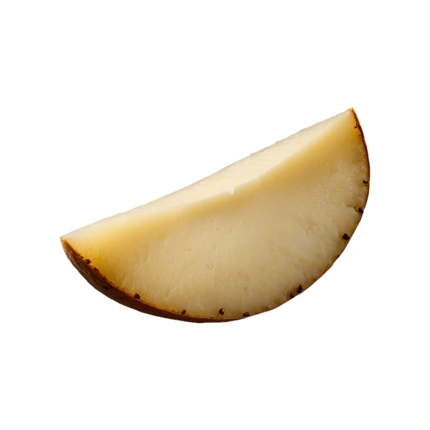 Single raw potato wedge isolated on white background
