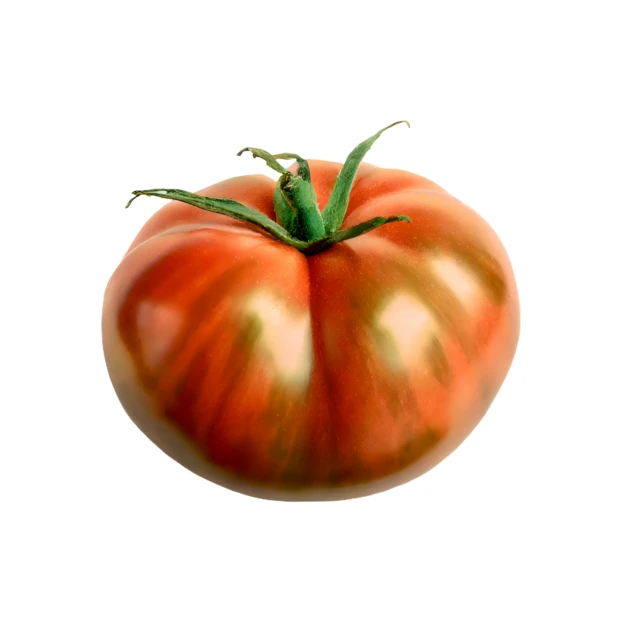 Fresh heirloom tomato isolated on white background