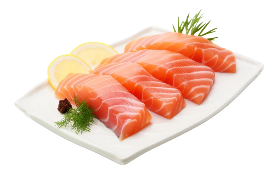 Fresh raw salmon slices with lemon and dill on plate