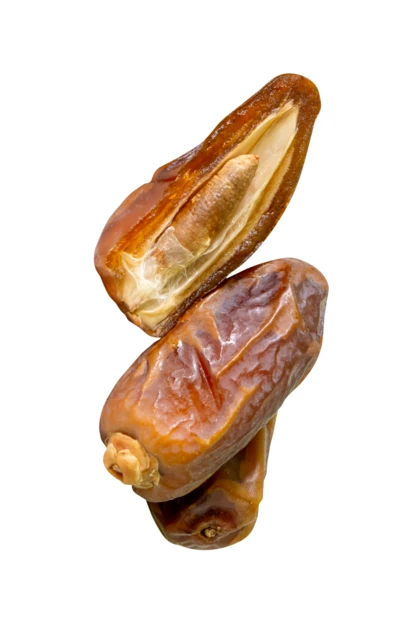 Dried dates with one cut open isolated on white background