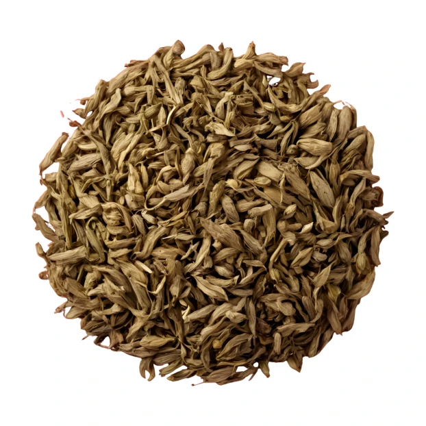 Overhead view of a pile of dried green tea leaves