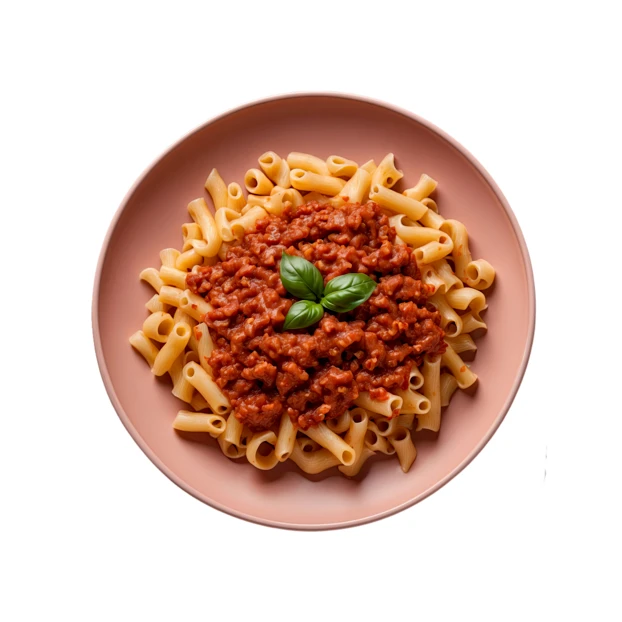 Macaroni pasta with meat sauce and basil garnish