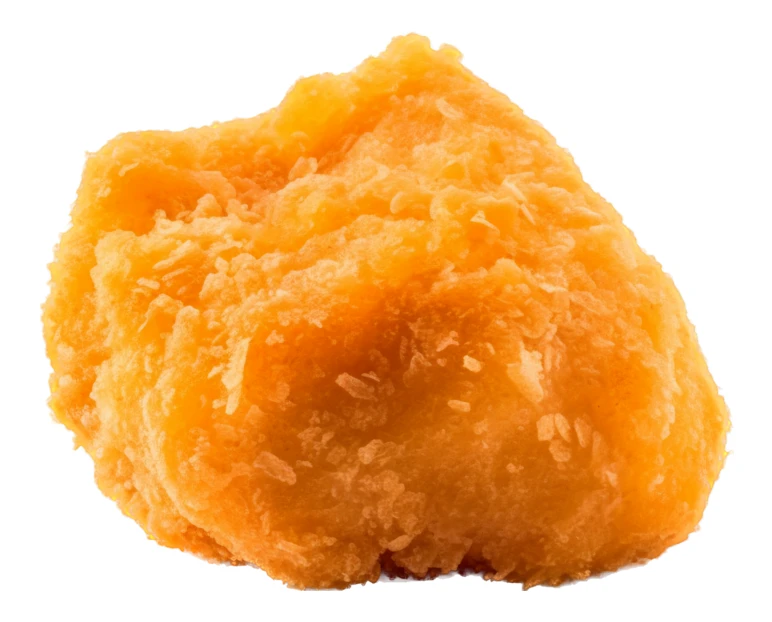 Single crispy fried chicken nugget isolated on white background