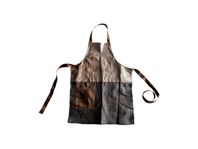 Vintage industrial canvas apron isolated on white background