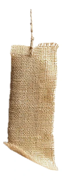 Rustic burlap fabric tag hanging on white background