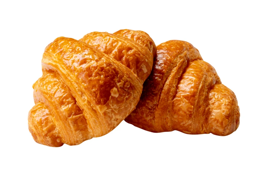 Two buttery golden croissants isolated on white background