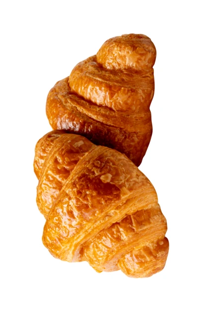 Two fresh golden croissants isolated on a white background