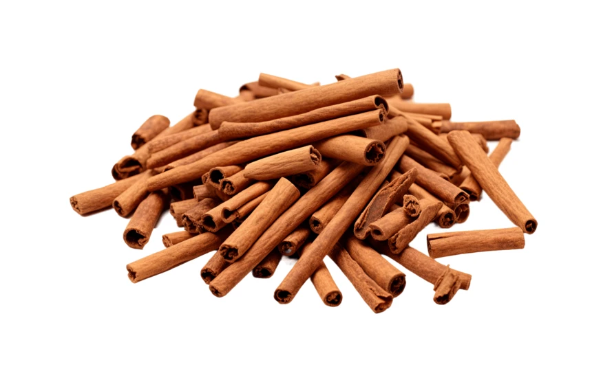 Pile of cinnamon sticks isolated on white background