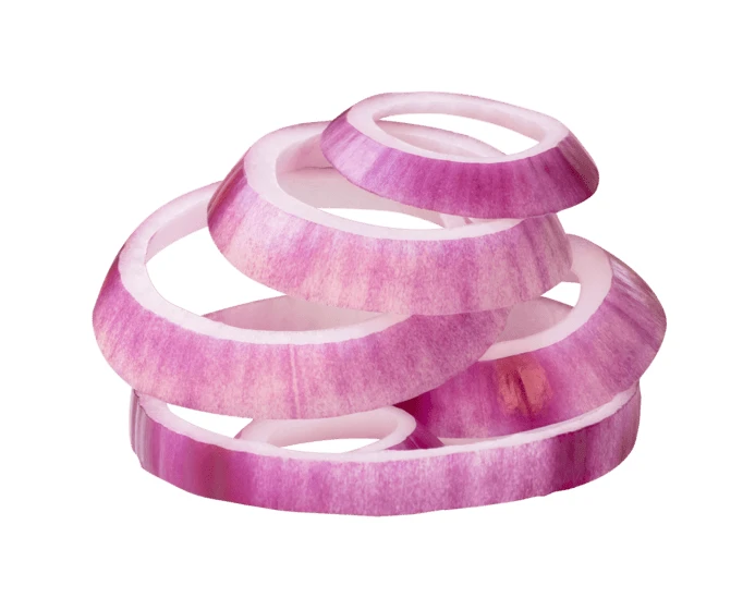 Sliced red onion rings stacked on a white background