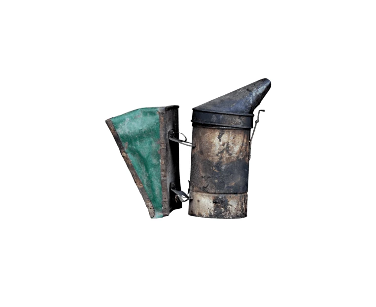 Vintage metal beekeeping smoker isolated on white background