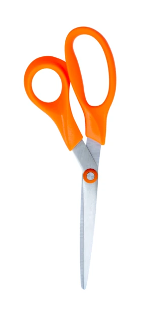 Pair of scissors with orange handles on white background