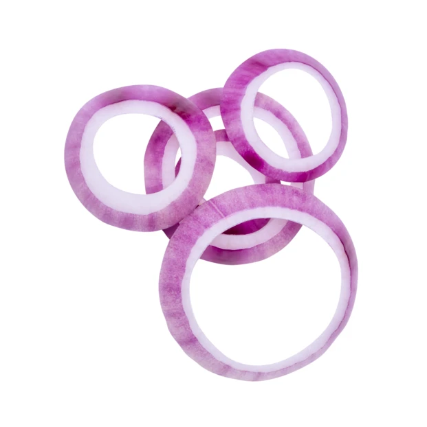 Sliced red onion rings isolated on white background