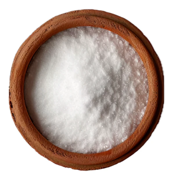 Top view of white salt in a rustic clay bowl