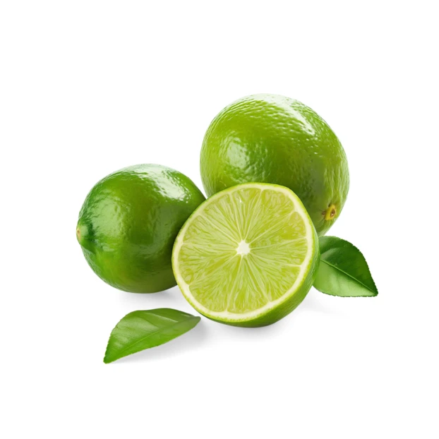 Whole and sliced limes with green leaves on white background