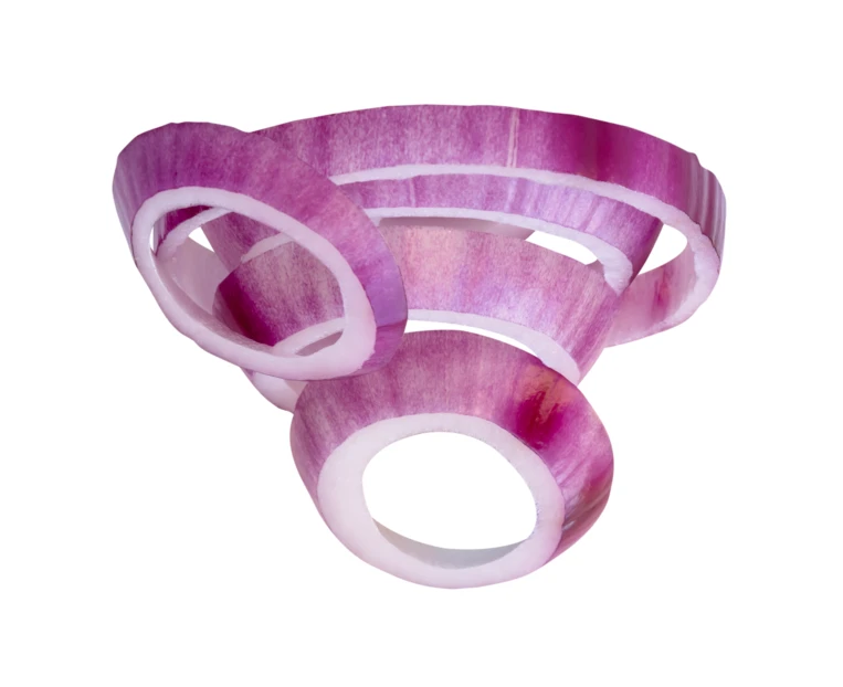 Fresh red onion rings isolated on white background