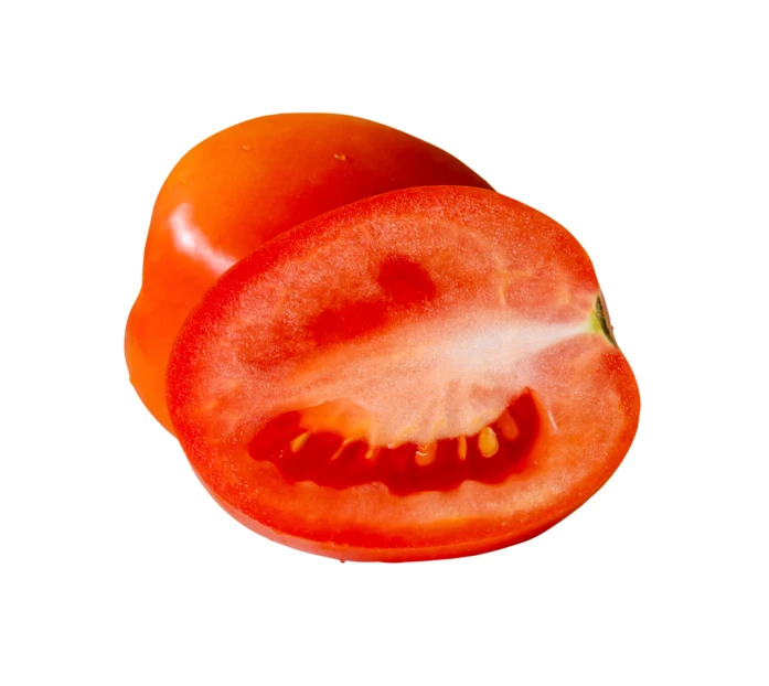 Half and whole red roma tomato isolated on white
