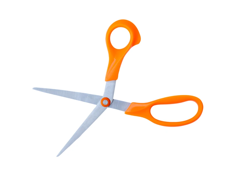 Open orange-handled scissors isolated on white background