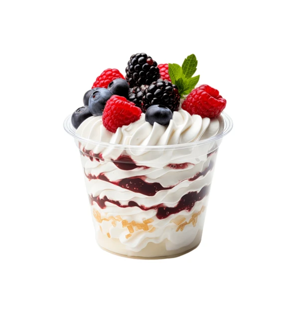 Berry parfait with whipped cream and fresh mixed berries