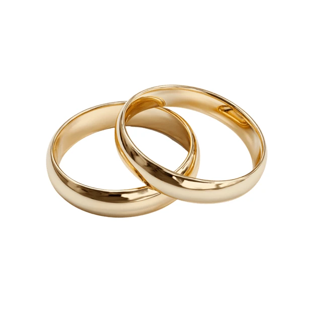 Two interlocking gold wedding rings isolated on white background