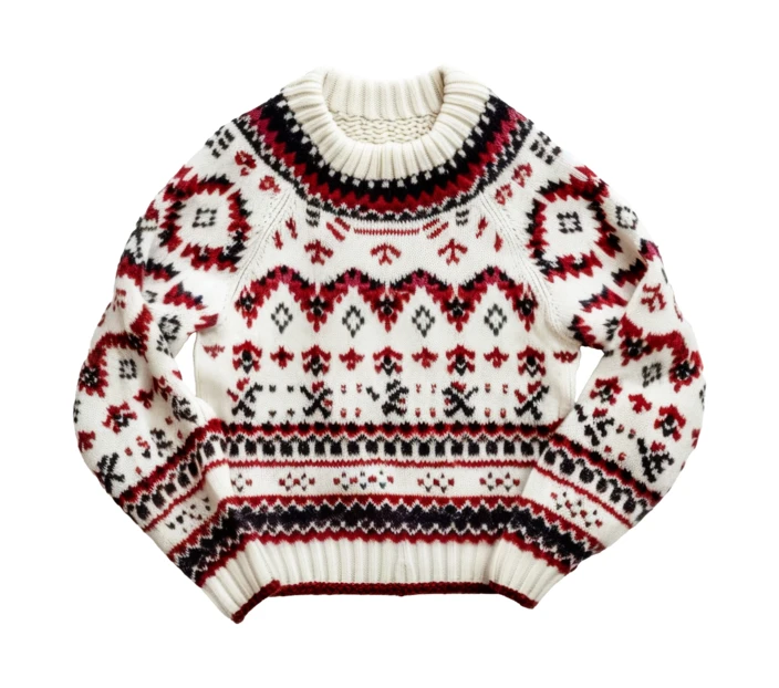 Cozy white knit sweater with red and black patterns