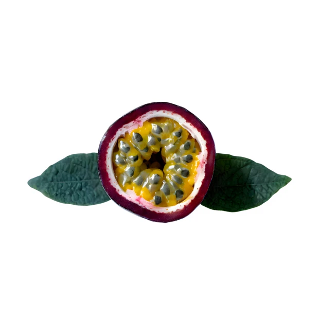 Half of a passion fruit with green leaves isolated