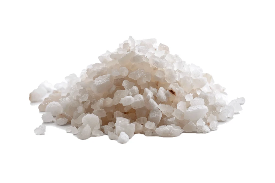 Pile of coarse white sea salt isolated on white