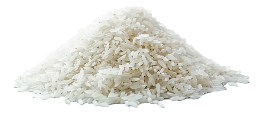 Pile of uncooked white long-grain rice isolated on white background