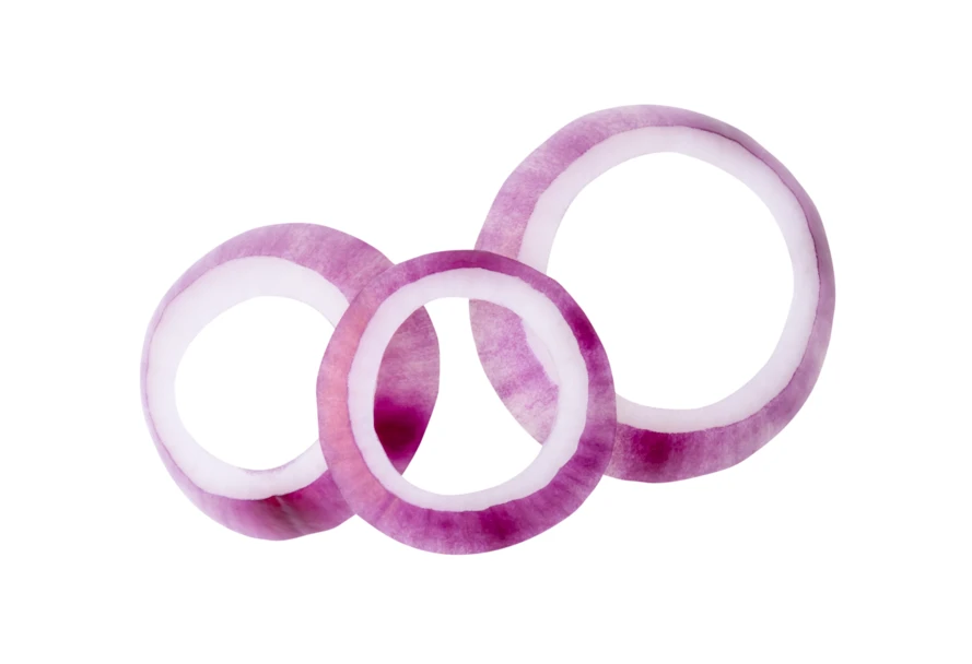 Three sliced red onion rings isolated on white background
