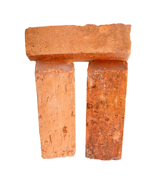 Three red clay bricks isolated on white background