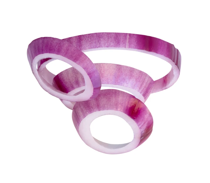 Fresh red onion rings isolated on white background