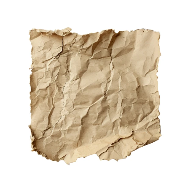 Crumpled and torn piece of aged brown paper