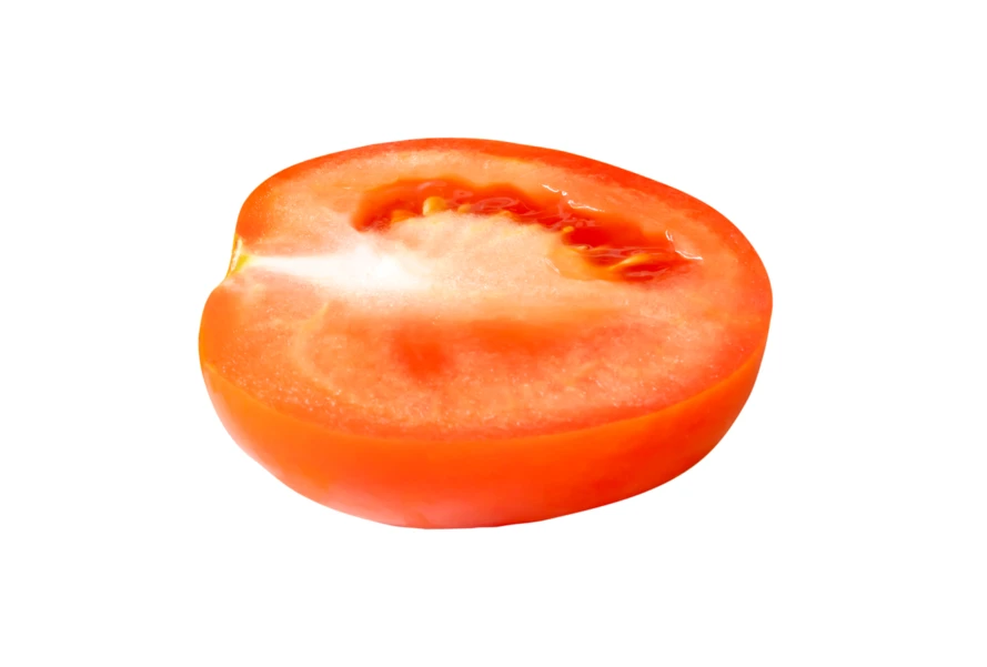 Cross section of a ripe red tomato isolated on white