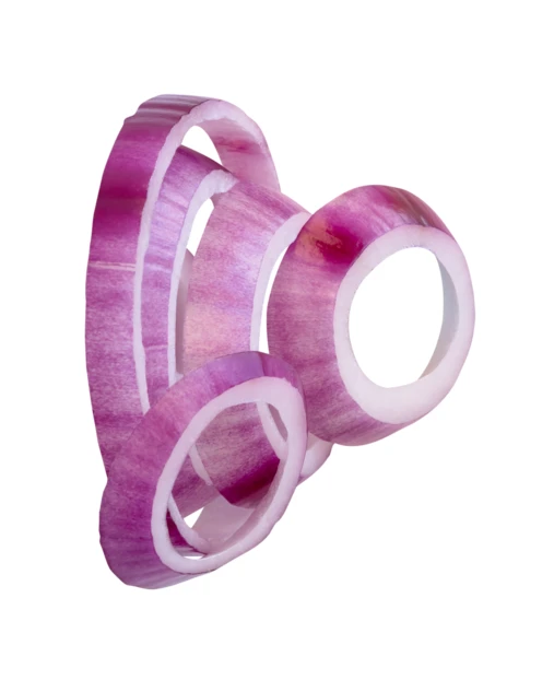 Fresh sliced red onion rings floating on white background