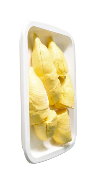 Fresh yellow durian pulp in a white plastic tray