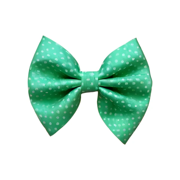 Mint green polka dot bow tie isolated on white background