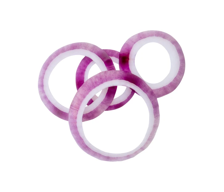 Sliced red onion rings isolated on white background