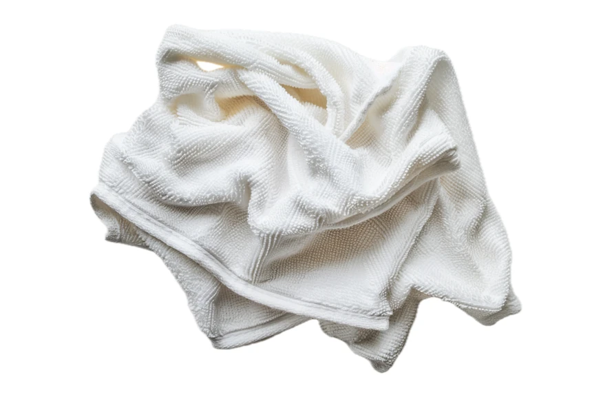 Crumpled white cotton towel isolated on white background
