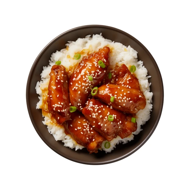 Glazed teriyaki chicken wings with rice and sesame seeds