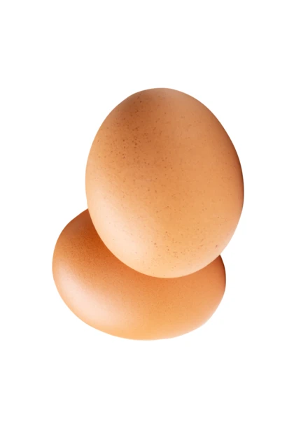 Two brown chicken eggs isolated on white background