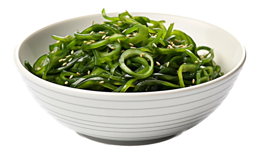 Fresh seaweed salad with sesame seeds in a white bowl