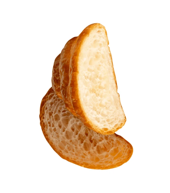 Sliced buttery croissant isolated on white background
