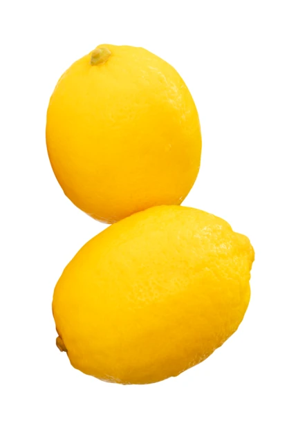 Two whole yellow lemons isolated on white background