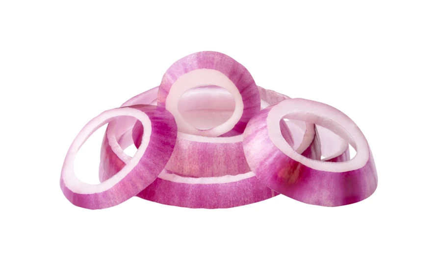 Sliced red onion rings isolated on white background