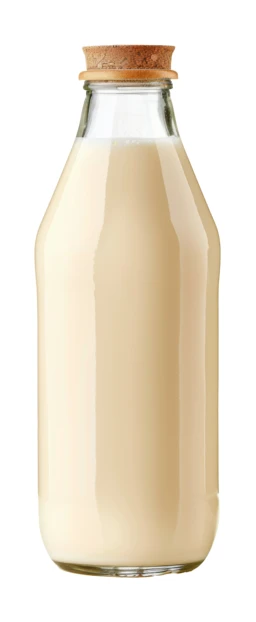 Glass bottle of baked milk with cork stopper isolated