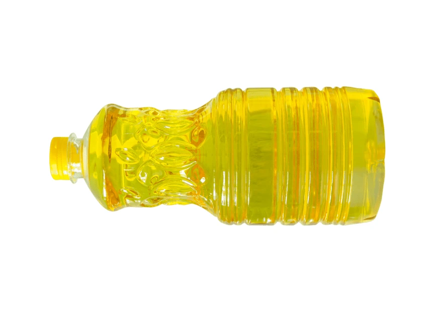 Yellow cooking oil in plastic bottle isolated on white