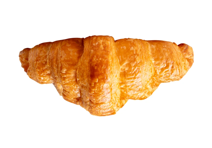 Fresh golden brown flaky croissant isolated on white background