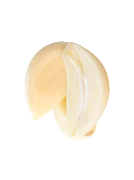 Two peeled fresh garlic cloves isolated on white background
