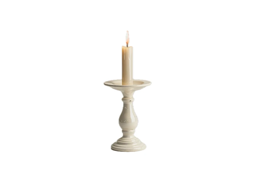 Lit candle on ceramic candlestick holder isolated on white background
