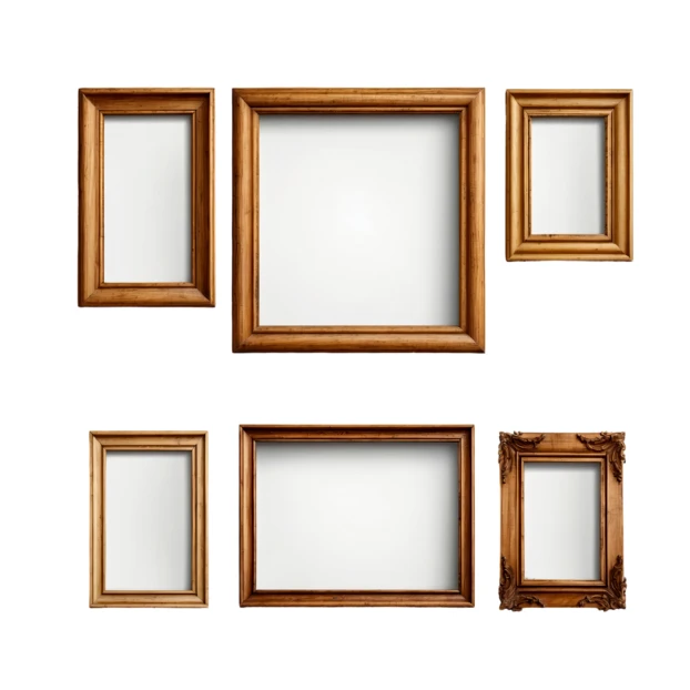 Collection of various wooden picture frames on white background