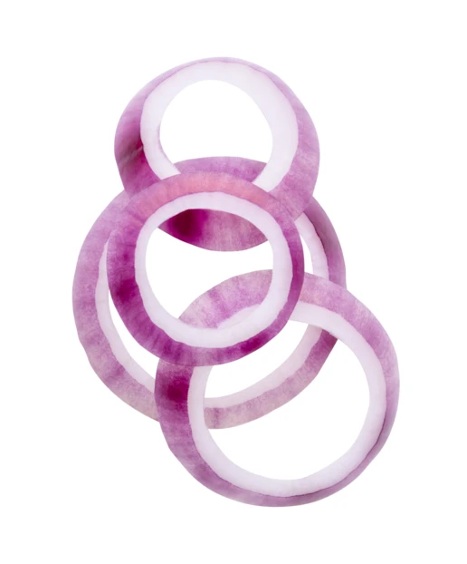 Fresh sliced red onion rings isolated on white background
